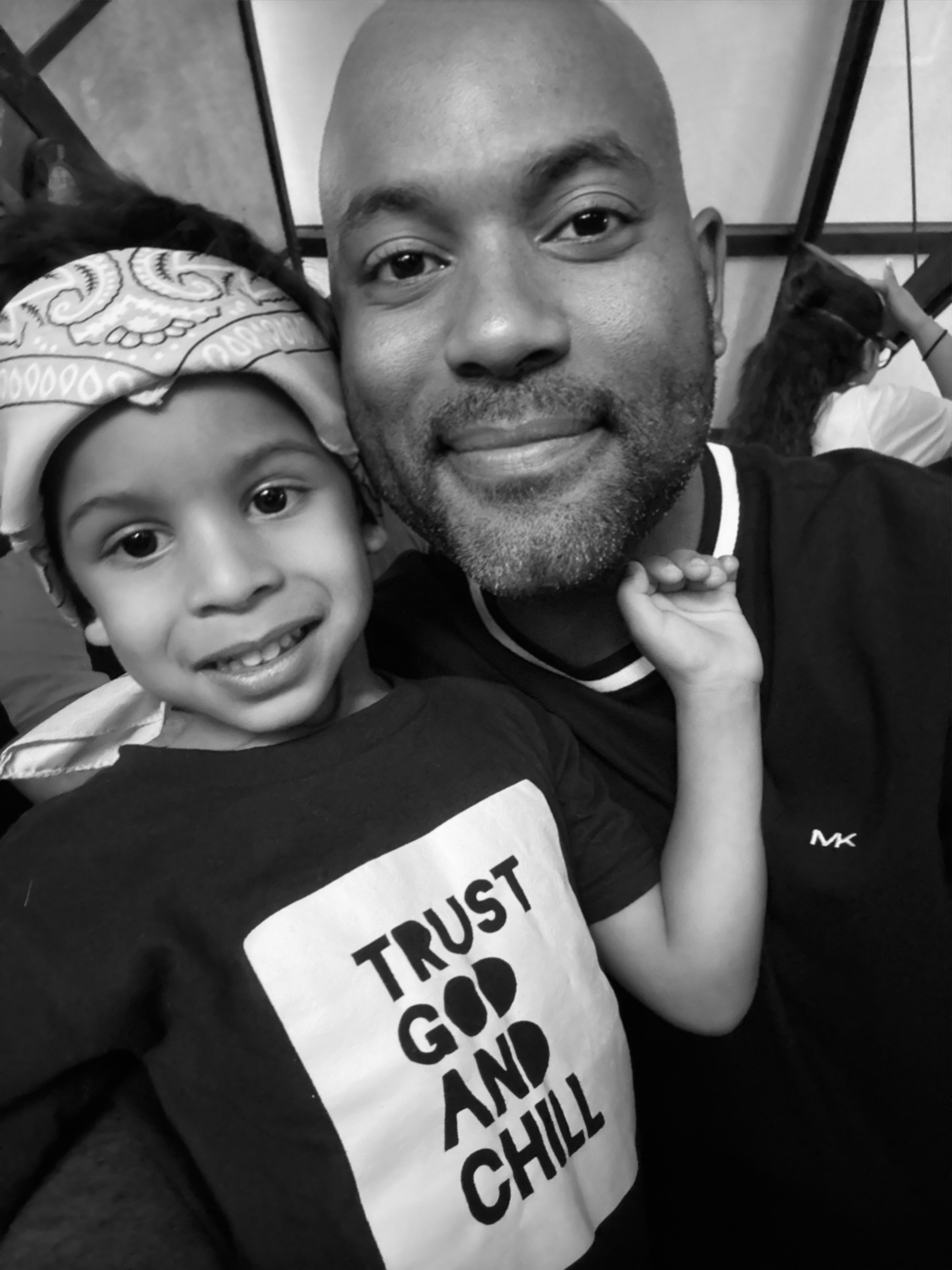 Joshua Mendez, founder of Marcel Properties, with his son
